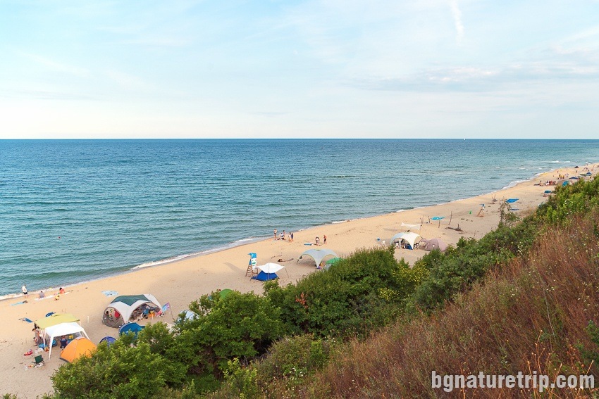 Many campers in the wild have placed their tents on the sand at Irakli Beach, Bulgaria